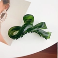 Elegant emerald green bow hair claw clip with a glossy translucent resin finish - Large / Green