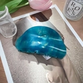Blue translucent acrylic hair claw clip with gold glitter in a minimalist crescent design - Green