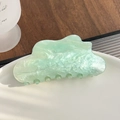 Elegant mint green marble acrylic hair claw clip with subtle shimmer and cloud shape - Cyan