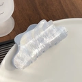 Elegant wavy light blue iridescent acrylic hair claw clip on white ceramic plate - Light Blue