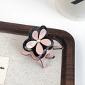 Pink and black clover hair claw clip with a sparkling crystal center for women - Pink