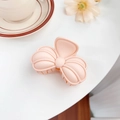 Matte peach pink bow-shaped hair claw clip for women in a minimalist candy color style - Cream Orange 8.5CM