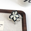 Elegant black and white clover acetate hair claw clip with a centered sparkling rhinestone - Off White