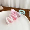 Large wavy hair claw clip featuring a pink and mint green glossy gradient finish - Snake S-Shape Claw Clip