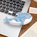 Blue and white dolphin acetate hair claw clip with marble texture on laptop background - Blue Dolphin