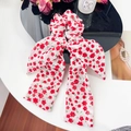 Floral print hair scrunchie with long bow in white fabric and red flower patterns - Double Layer Ribbon
