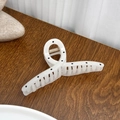 Minimalist large hair claw clip in creamy white with black polka dots for women - White Crossed Style