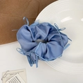 Elegant misty blue satin scrunchie with delicate ribbon bows for a balletcore hairstyle - Blue