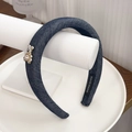 Padded dark blue denim headband featuring a gold pearl bear accent and handmade label - Blue Bear Style