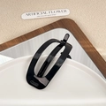Minimalistische schwarze glänzende ovale Haarklammer in elegantem, hohlem Dreh-Design - Schwarz