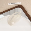 Minimalist oval hollow hair clip in cream white acrylic with a translucent glossy finish - Moonlight White