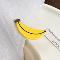 Niedliche gelbe Bananen-Haarklammer aus Acetat mit Hochglanz-Finish und schwarzen Akzenten - Banane