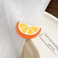 Acetate hair clip featuring a realistic orange slice design with bright citrus textures - Orange
