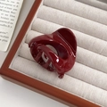 Elegant wine red pumpkin hair claw clip for ponytail on a beige jewelry display box - Burgundy