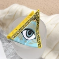 Gele en blauwe haarklem van acetaat met een boze oog ontwerp en gouden versieringen - Boze oog