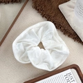 Elegant cream white velvet scrunchie with soft ruched texture for women's hair styling - White