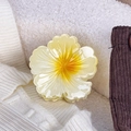 Elegant pale yellow flower hair claw clip with glossy resin finish for summer vacation - Yellow