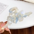 Elegant pearlescent blue-purple acetate shark hair claw clip with triple rose design - Iridescent White