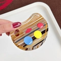 Artistic palette hair claw clip in tortoise shell finish with colorful paint dots - Palette Shape