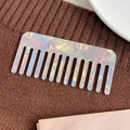 Holographic wide tooth hair comb with marble texture and iridescent resin finish - Iridescent White