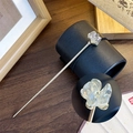 Elegant silver hair pin with translucent floral petals and sparkling center stone - Clear