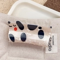 Cartoon dog claw clip made of pearlescent acetate fiber with black spots and red accents - Spotted Puppy