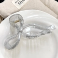 Pinza per capelli a fiocco argento glitterato con finitura lucida e design raffinato - Fiocco