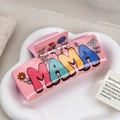Pinza per capelli in acrilico rosa con scritta MAMA e motivi floreali chic - Girasole (MAMA)