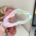 Iridescent hollow cloud hair claw clip in pearl gradient finish held by hand - Gradient Cyan-Cloud Small