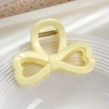 Elegante pinza per capelli a fiocco color crema in resina lucida con molla dorata - Fiocco Cuore-Giallo