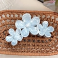 Set van drie blauwe marmeren bloemen haarklemmen voor elegante kapsels - Blauw