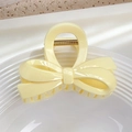 Pince à cheveux n&oelig;ud jaune crème élégante avec finition brillante et ressort doré - Nœud Ruban-Jaune