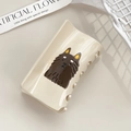 Creamy white acetate hair claw clip featuring a dark brown cartoon puppy pattern - Rectangle German Shepherd