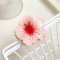 Pink gradient plumeria hair claw clip with translucent petals for a fresh resort look - Red