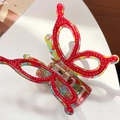 Colorful butterfly hair claw with red glitter edges and pearls in acrylic material - Red