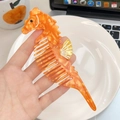 Seepferdchen-Haarkamm mit langem Griff in leuchtend oranger Marmor-Optik Azetat - Orangefarbenes Seepferdchen