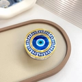 Support de téléphone œil grec bleu avec motif méandre sur plateau en cuir beige - Œil 6