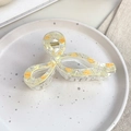 Elegante transparante haarklem met gele geometrische patronen en gouden metalen veer - Gele Strik