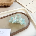 Elegant marbled blue acetate bow hair claw clip with pearlescent finish for women - Floral Blue