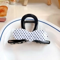 Hair claw clip with black glossy finish and white polka dot bow in a stylish design - Black and White Polka Dot Heart
