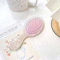 Spazzola per capelli portatile in marmo avorio con setole azzurre e cuscinetto rosa - Bianco Iridescente