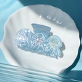 Pearlescent light blue jellyfish hair claw clip with a dreamy ocean theme design - Jellyfish