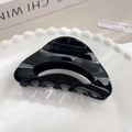 Minimalist black glossy triangle hollow hair claw clip with sleek finish for women - Black