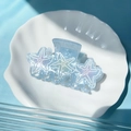 Light blue starfish hair claw clip with pearlescent purple gradient in a sea theme - Starfish