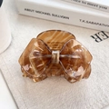 Elegant tortoise shell bow hair claw clip in dark brown marble pattern for women - Starry Yellow
