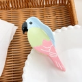 Elegante pinza de pelo de loro en acetato azul pastel y rosa para peinados de coleta alta - Loro Azul Claro