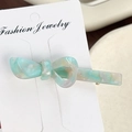 Pasador de pelo con lazo de acetato jaspeado azul verde en tarjeta de joyería blanca - Verde esmeralda