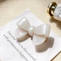 Elegant pearlescent white acetate bow hair clip with luxury iridescent mother of pearl finish - Mermaid White