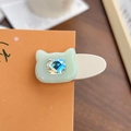 Barrette chat en acétate vert menthe ornée d'un cristal bleu brillant au centre - Moyen / Vert Pâle