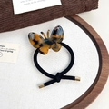Élastique à cheveux chic avec papillon en acétate à motif écaille de tortue brun et noir - Écaille Café